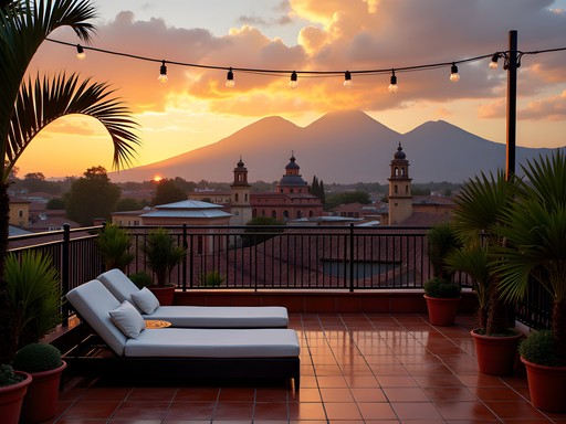 Rooftop terrace at Pensativo House Hotel with stunning views of Antigua's colonial cityscape and volcanoes