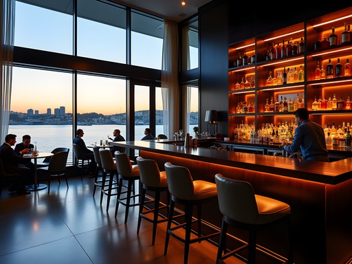 Sophisticated Captain's Bar at Park Hyatt Auckland with harbor views at sunset