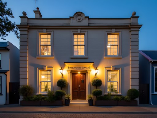Historic limestone facade of boutique hotel in Fremantle with heritage architectural details