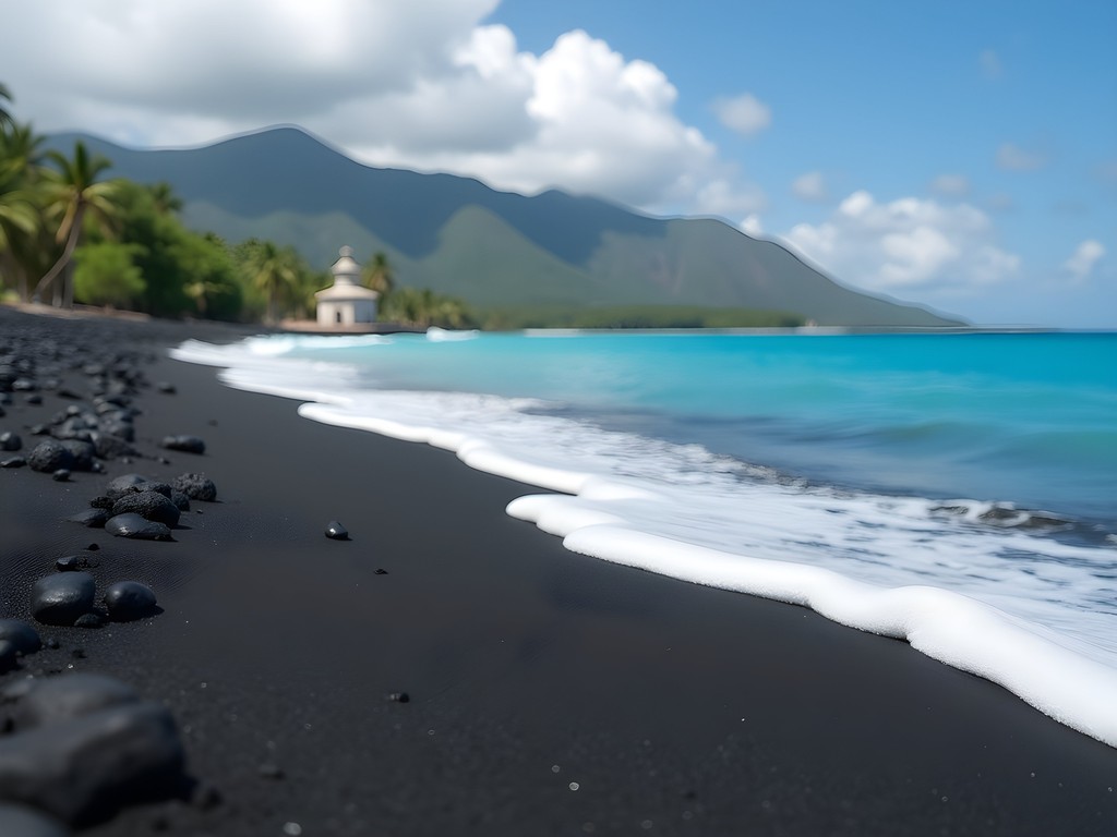 Dramatic black volcanic sand beach with turquoise waters at Playa Duaba