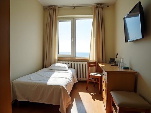 Simple but clean budget guesthouse room in Varna with sea view