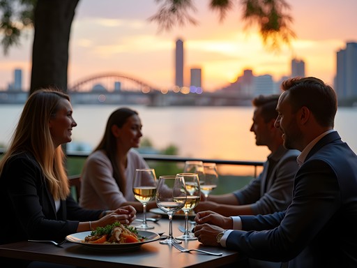 Elegant business dinner at riverside restaurant in Brisbane