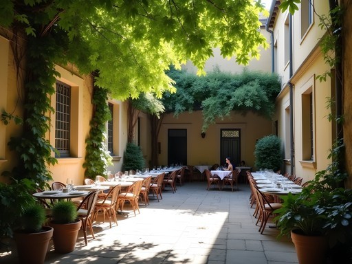Secret courtyard garden in Avignon with stone walls and shade trees