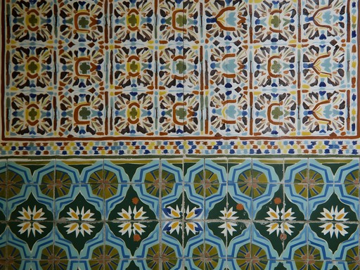 Intricate Moorish tile patterns at Real Alcázar palace in Seville