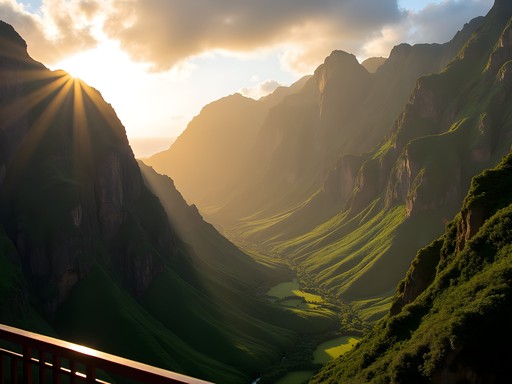 Dramatic Ko'olau mountain range at sunrise with low clouds from luxury resort viewpoint