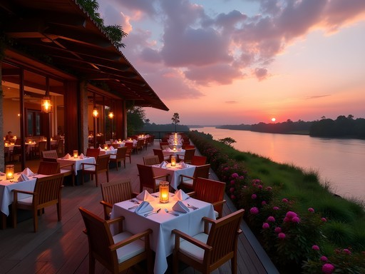 Elegant riverside dining terrace at Kintambo Kuna Lodge in Kinshasa at sunset with Congo River views