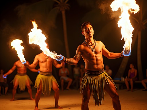 Traditional Tahitian fire dancers performing at night in Papeete