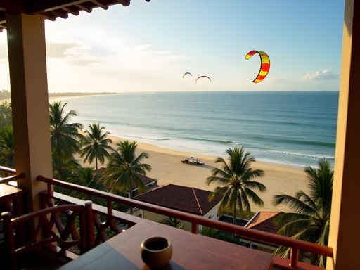 Beachfront accommodations in Mui Ne with kite surfers in background