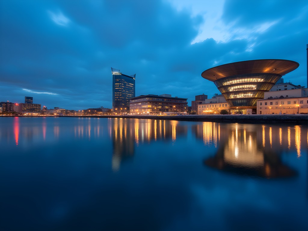 Cardiff Bay buildings reflecting in water during blue hour