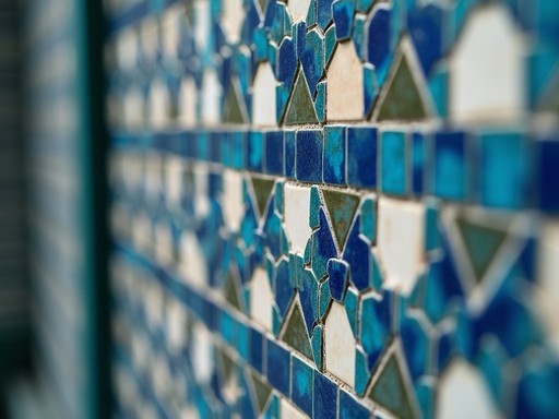 Close-up detail of intricate geometric blue tile patterns on the Blue Mosque walls