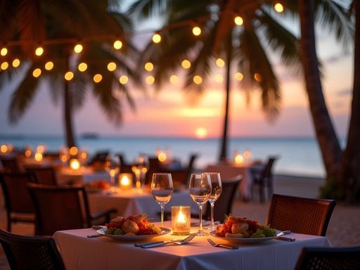 Beachfront dinner setting at Oualie Beach during sunset in Nevis