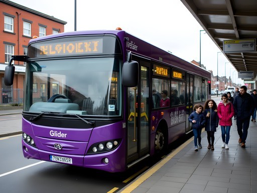 Belfast Glider public transport vehicle at a station with families boarding
