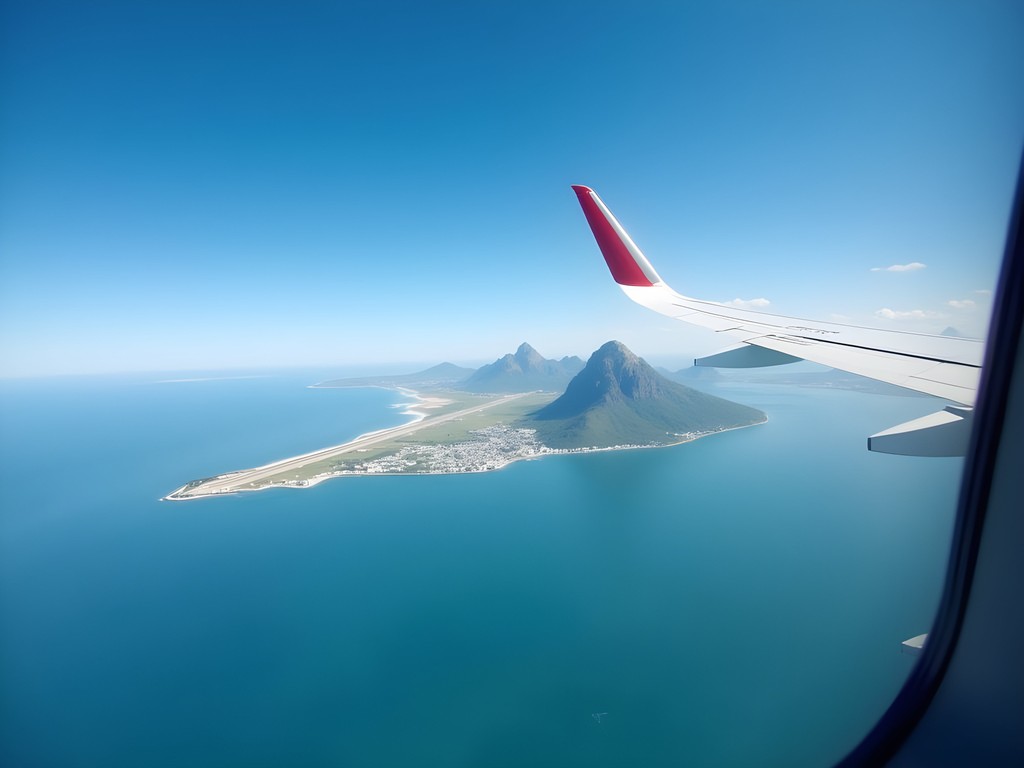 Aerial view of approach to Santos Dumont Airport with Sugarloaf Mountain and Guanabara Bay visible
